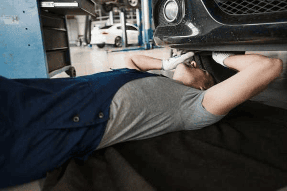 Auto Action Tech mechanic is installing car safety feature